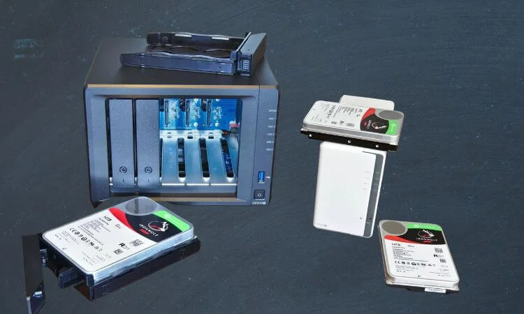 Different types of hard drives and a rack - NAS
