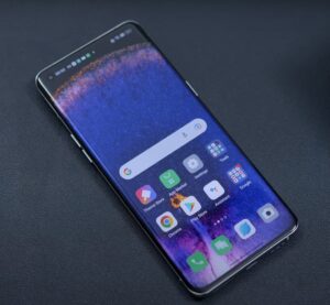 The image presents the front side of the Oppo Find X5 Pro Photo of the front side of the Oppo Find X5 Pro with a dark background