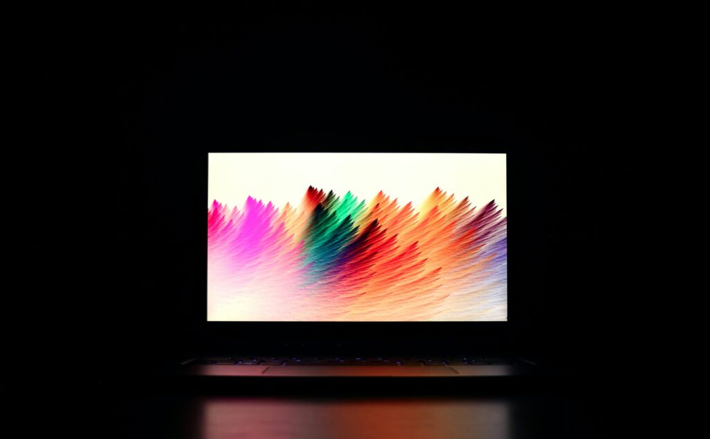 Photo of a colorful display Photo of a gaming laptop display with bright colors on it.